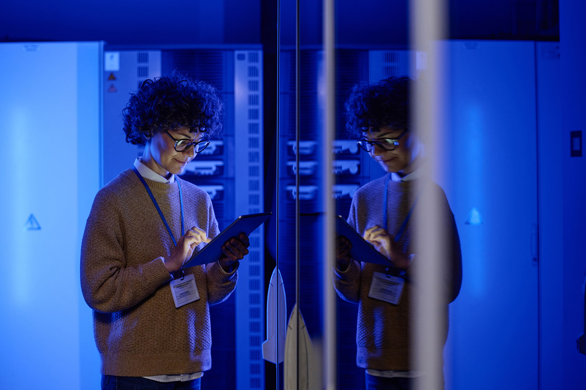 Woman archiving in the storage server room